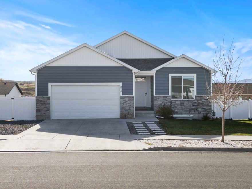 Nearly new and move-in ready! Built in 2022 this 3-bedroom, 2-bath home with an unfinished basement, offering excellent potential for future living space or storage. Enjoy a fully fenced backyard and the convenience of a Tesla EV charger. A functional layout, newer construction, and room to grow make this home a great opportunity! Link to HOA https://www.premier-communities.com/elk-mountain
