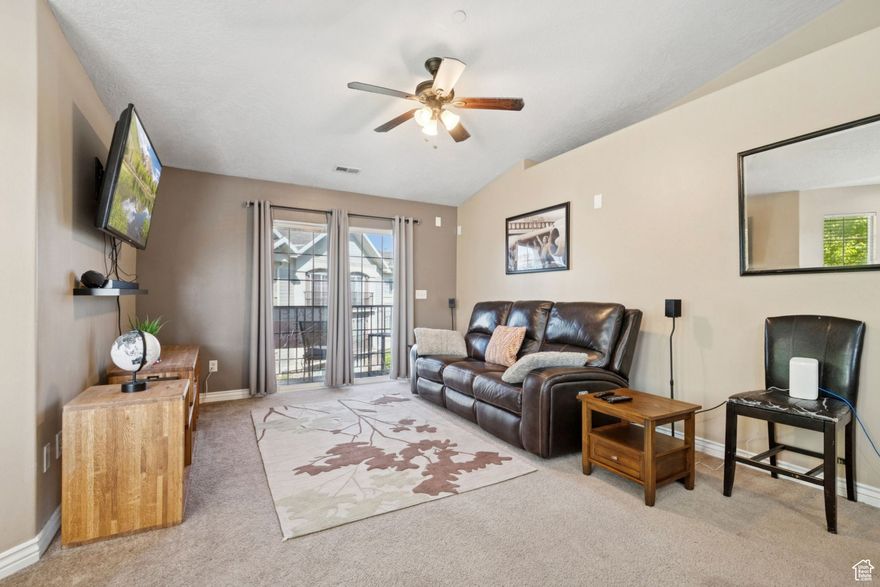 THIS CONDO WILL GO FHA!!! Welcome home to this amazing top-floor condo, ideally located just moments from shopping, dining, parks, and freeway access. As you step inside, you're greeted by vaulted ceilings and an open-concept layout that fills the space with natural light and warmth.  This move-in ready home features a spacious primary suite with a walk-in closet and private bath-your own peaceful retreat. You'll also love the convenience of in-unit laundry with a bonus storage area just off the laundry room, offering plenty of space to stay organized.  Enjoy low-maintenance living with access to fantastic community amenities, perfect for simplifying your lifestyle without sacrificing comfort. Whether you're a first-time buyer or looking to downsize, this condo has everything you need to feel right at home.  Don't miss this one-it's the perfect blend of location, convenience, and comfort!