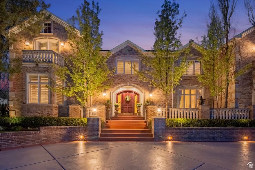 This is your rare opportunity to own one of the top properties in the popular and sought-after Roselan's gated community in leafy Holladay. The location offers the lifestyle of a pristine wooded park. Buyers request this location for its accessibility, ease of commute and overall privacy. This beautifully crafted estate offers an expansive and well designed floor plan with refined architectural details and exceptional craftsmanship throughout. The gourmet kitchen is a chef's dream, featuring Thermador, Meile, and Sub-Zero stainless steel appliances, granite countertops, and custom cabinetry. Soaring vaulted ceilings and abundant natural light enhance the home's open and airy feel. The main level includes dual offices, a luxurious primary suite with private deck access and hot tub, a spa-inspired en-suite bathroom, and a very large custom walk-in closet complete with its own laundry. Perfect for entertaining, the home includes a 24-seat theater room with a compelling 50's themed diner gathering area, a full commercial-style gym setup, a craft room, and a separate fully functional kitchen/bathroom, 2-bedroom apartment above the garage with private access. Step outside to your own backyard retreat, complete with a spacious covered patio with fireplace designed for relaxation or entertaining. The patio and family room seamlessly blend for indoor/outdoor living. The fully operational outdoor kitchen, large in-ground swimming pool with diving board, custom stone hot tub, and a spacious yard add to the luxurious feel of the home. The oversized six-car heated garage features epoxy floors and water access. The basement includes a complete indoor spa with a full sauna and steam room and a wet bar/dance area in addition to expansive separate dry storage and food storage rooms. Located near the Cottonwood Canyons, this home offers access to world-class skiing and hiking while being just minutes away from shopping, dining, and top-tier public and private schools. This is truly a rare opportunity to own a piece of luxury in one of Holladay's most sought-after neighborhoods. Square footage figures are provided as a courtesy estimate only and were obtained from appraisal sketch.  Buyer is advised to obtain an independent measurement.