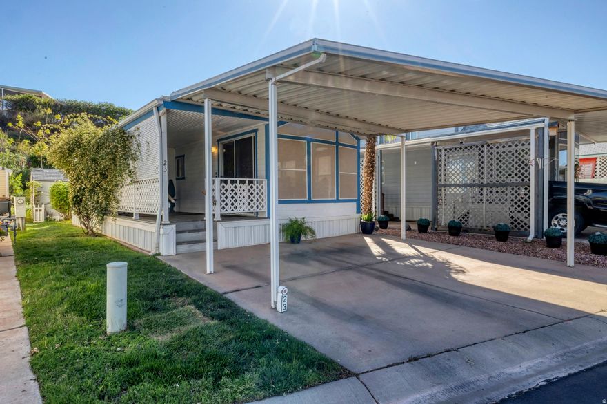 Enjoy easy, peaceful living in this lovingly cared-for 1 bedroom, 1 bathroom home nestled in a quiet 55+ community. The inviting covered front porch sets the tone for relaxed mornings and cool desert evenings. Out back, you'll find a thoughtfully terraced yard with mature trees, cactus, and flowering shrubs that draw in birds and create a serene, nature-filled retreat. Located just moments from the beautiful Virgin River walking and biking trail, the neighborhood also offers a low HOA with access to an indoor pool, clubhouse, and convenient laundry facilities.  Square footage figures are provided as a courtesy estimate only and were obtained from county records.  Buyer is advised to obtain an independent measurement.