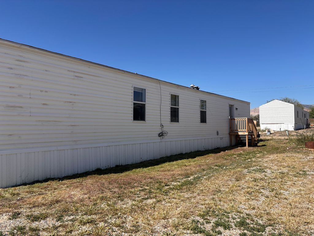 Photo of 425 N ESQUIRE PKWY #42, Castle Dale, UT 84513 (MLS # 2157130)