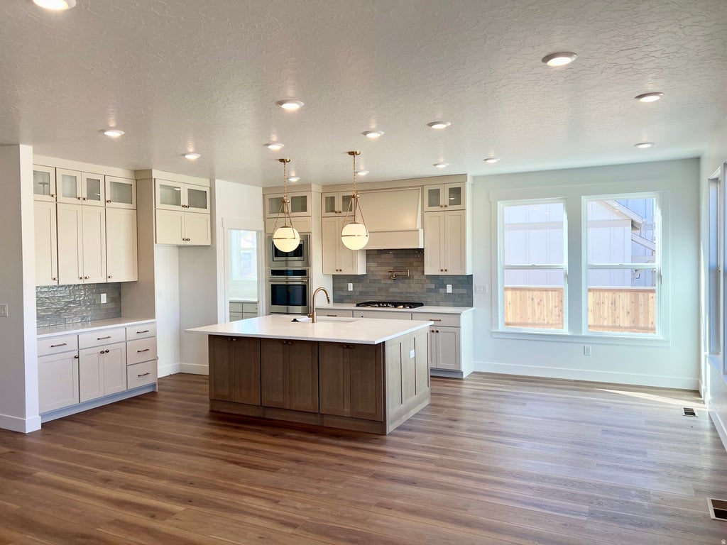 Photo of 11584 S MARKFIELD WAY W #1-102, South Jordan, UT 84009 (MLS # 2185585)