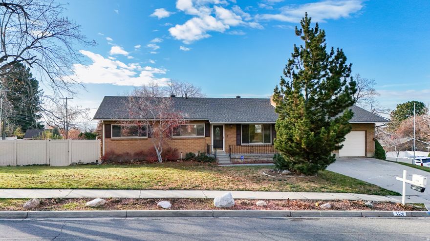 Looking for a home for the holidays? You just found it! This spacious Bountiful rambler sits on a corner lot with plenty of room to host every gathering-from cozy movie nights to full-blown family parties. And if you need even more space, you're in luck: a full-length sunroom stretches across the back of the home, ready to become whatever you can imagine. Homework zone? Game room? Craft haven? Extra holiday seating? Yes, yes, yes, and yes.  Step out onto the multi-tier deck for even more room to relax or entertain. Inside, fresh paint and new flooring make everything feel bright and move-in ready. Two pellet stoves (pellets included!) help keep things warm and efficient, while a basement entrance adds extra convenience. Need more parking? There's even a gated side entrance for additional vehicle space.  Make your appointment to for a private tour today!