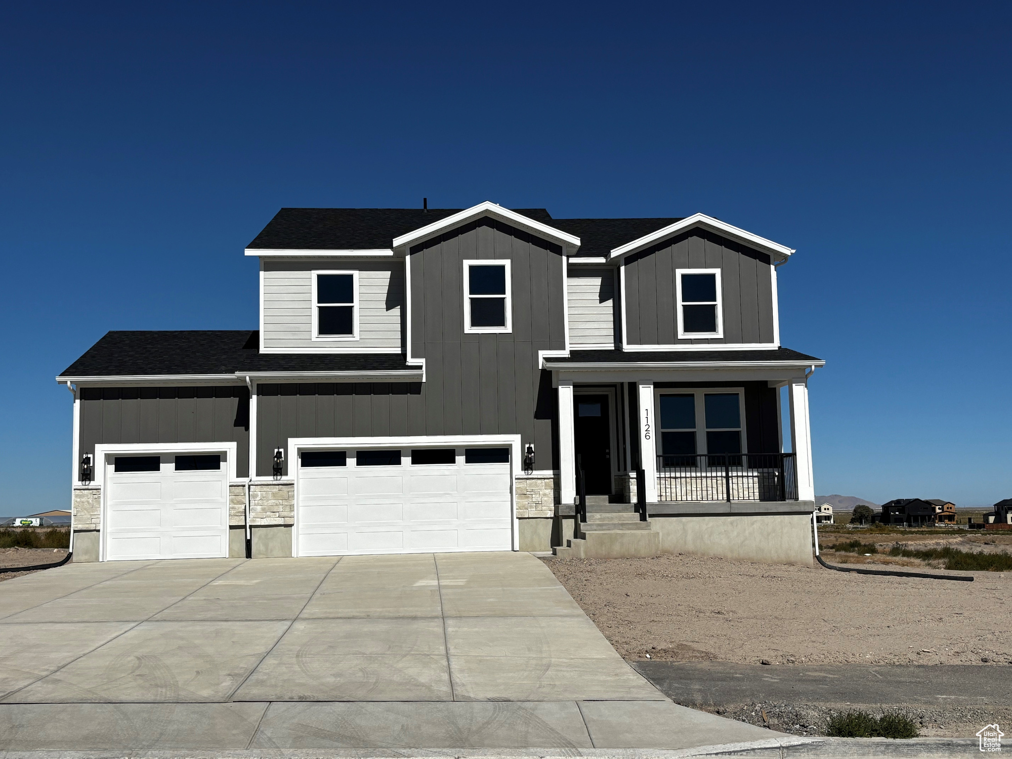 Brand New Home in Grantsville City! This Jefferson plan, on a .76 acre lot, offers a 3 car garage with extra depth, spacious rooms, open great room with a gas fireplace with stone to the ceiling, main floor office, covered deck and so much more! Plus, the unfinished basement provides an opportunity for future growth. Don't miss out on this beautiful, brand new home in a community that provides an open and peaceful setting!