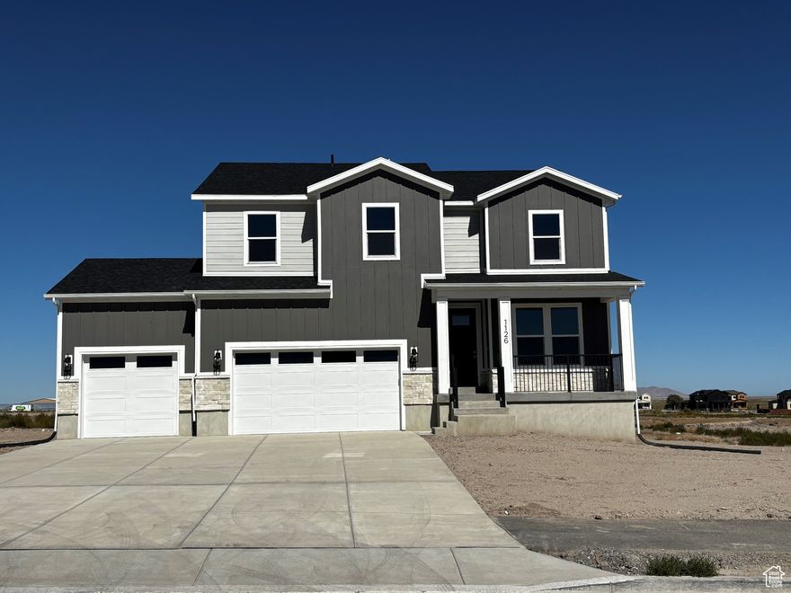 Brand New Home in Grantsville City! This Jefferson plan, on a .76 acre lot, offers a 3 car garage with extra depth, spacious rooms, open great room with a gas fireplace with stone to the ceiling, main floor office, covered deck and so much more! Plus, the unfinished basement provides an opportunity for future growth.  Don't miss out on this beautiful, brand new home in a community that provides an open and peaceful setting!