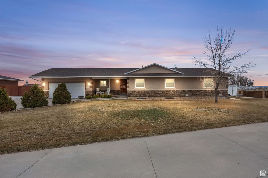 Beautiful 5-bedroom, 4-bathroom home in a highly desirable cul-de-sac location! This stunning property features a fabulously updated kitchen with granite countertops, an oversized island, a Thermador induction cooktop, and an LG fridge with a front-entry door. Enjoy outdoor living on the expansive 15' x 28' covered Trex deck, complete with a Bullfrog hot tub, overlooking a private, fenced yard.   With RV parking, two entrances to the city street, and ample parking for toys and vehicles, this home offers both convenience and functionality. The main level is designed for entertaining, with open spaces perfect for formal dining and living. The spacious primary suite includes an ensuite bathroom with an oversized shower and a walk-in closet. Additional features include an office/workout room, two laundry rooms, dual furnace and AC units, two water heaters, and a full automatic sprinkler system. This home is a rare find with exceptional updates and plenty of space-don't miss out!