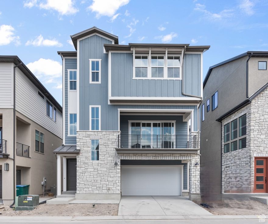 Brand new Whistler Farmhouse cottage home, nestled in a premier master-planned community in Lehi within minutes of Thanksgiving Point! This charming residence features a modern kitchen with white maple cabinets and quartz countertops, complemented by sleek platinum gas appliances and a stylish tile backsplash. This home offers a blend of laminate hardwood, tile, and carpet flooring, providing a perfect balance of elegance and comfort. Energy-efficient options and a tankless water heater ensure modern convenience, while the cozy gas log fireplace adds warmth and ambiance. The owner's bathroom boasts luxurious quartz shower surrounds and brushed nickel hardware, creating a serene retreat. Experience the perfect blend of functionality and aesthetics in this exquisite home! Comes fully landscaped and is maintained by the HOA for a hassle-free, easy maintenance lifestyle!