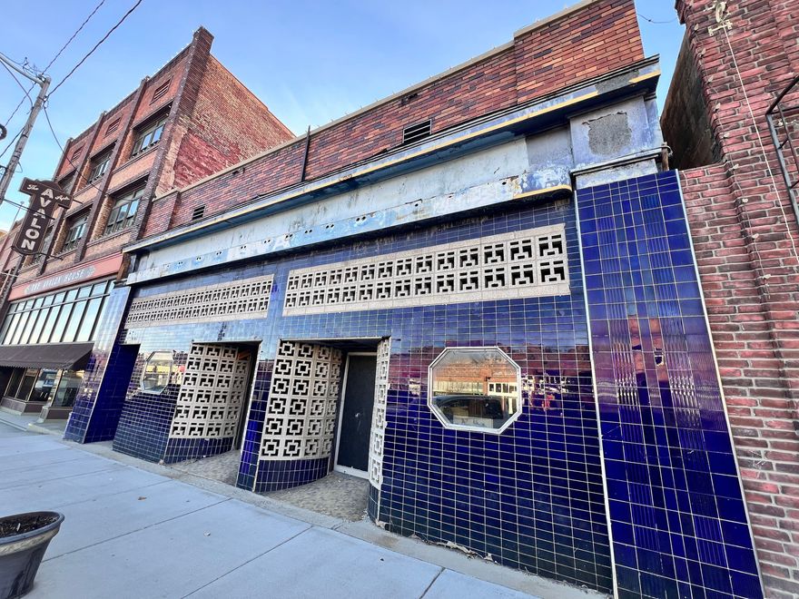 Bring your vision to life in the heart of Helper's Historic Main Street! This 1900's building has endless potential. The West facade has been beautifully rebuilt using reclaimed brick, new windows and new rain gutters, while the interior has been stripped to stunning exposed brick walls, ready for your custom touch. The building currently has 3 Main St entrances, 2 doors leading to the main level and 1 door that takes you to the full unfinished basement. The large rear parking area borders 100 West with 3 more entrance options, offering flexible access points, 2 on the main level and one being a new ADA compliant entrance to the basement. A new electrical panel is in place (needs connections) and a rear grease pit adds restaurant potential. Whether you dream of a retail storefront, cafe', office, or live/work space, this property offers a rare chance to create something special in Helper's thriving downtown.  Square footage figures are provided as a courtesy estimate only and were obtained from Carbon County Recorder.  Buyer is advised to obtain an independent measurement. Buyer to verify all listing information independantly.