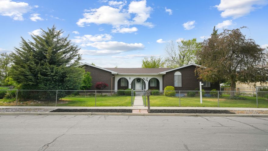 A charming 1970s gem that's been thoughtfully refreshed and ready for its next chapter. This home features new interior paint, brand new carpet, updated flooring, and a bright kitchen with new quartz countertops-offering a clean, move in ready feel while preserving its original character. Set on a spacious .25 acre landscaped yard, there's plenty of room to relax, entertain, or envision future enhancements. Recent improvements include a newer HVAC system and water heater for added comfort and peace of mind. With classic details and modern updates already completed, this is a wonderful opportunity to make it your own in a desirable Sandy location.