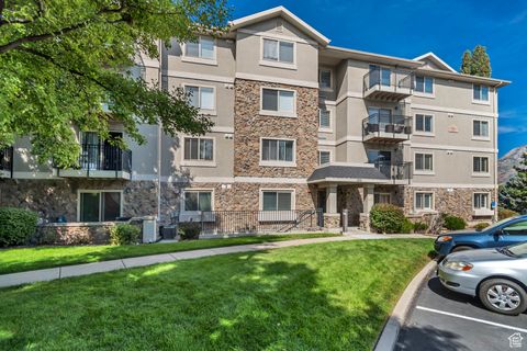 Photo of 1205 E PRIVOT DR #102, Cottonwood Heights, UT 84121 (MLS # 2114098)