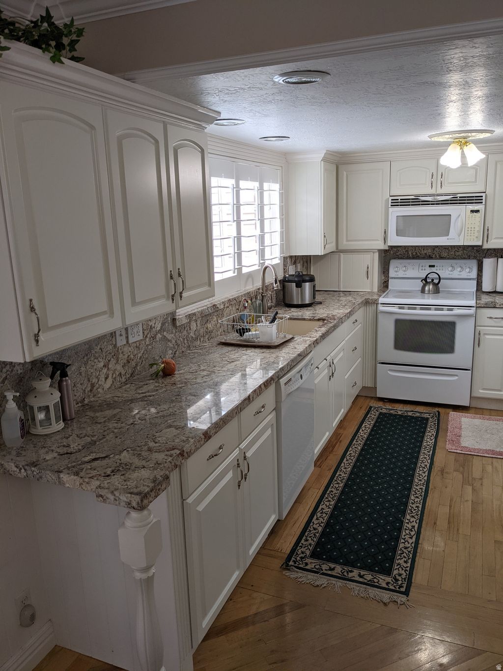 Photo of 765 E THREE FOUNTAINS CIR #28, Murray, UT 84107 (MLS # 2141284)