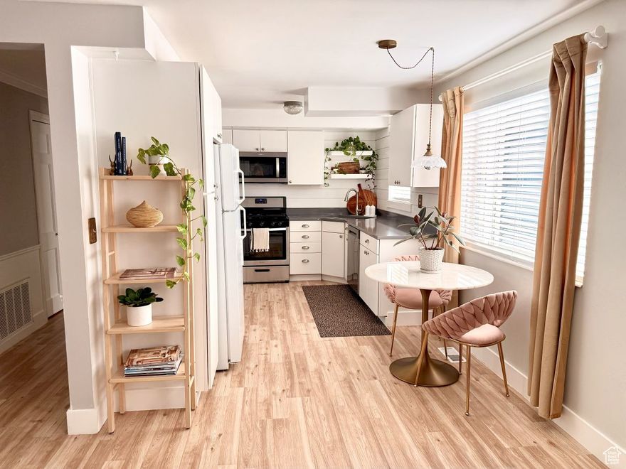 Experience Holladay's most desired location! This remodeled, move-in ready condo offers unmatched walkability to Holladay Village's dining, shops, local conveniences and more. Comfort meets charm in this bright open layout and serene courtyard. Enjoy effortless living with walkable access to everything Holladay Square has to offer-Harmons, local cafs and restaurants, Soho Food Truck Park, boutiques, spas, salons, gyms, the library, and more-all just steps from your front door. Just down the street, you'll also find a movie theater, co-working space, and a brand new Trader Joes! Recent updates include a remodeled kitchen with a gas range, new dishwasher, and light fixture; newer flooring throughout; new bedroom carpet; refreshed bathroom with updated vanity, tile, fixtures, and paint; new interior glass doorknobs with oil-rubbed bronze finish; and stylish antique brass outlet covers from Anthropologie. A keypad entry and covered carport steps away offer everyday convenience. Community amenities include two large swimming pools, a fitness center, sauna and beautifully maintained grounds with mature trees and gardens. Pet-friendly and peaceful, it offers a rare sense of privacy and charm right in the heart of Holladay. Move-in ready and thoughtfully cared for, this condo offers the perfect blend of thoughtful updates, style, and community, truly a special place to call home.   Square footage figures are provided as a courtesy estimate only and were obtained from County Records.  Buyer is advised to obtain an independent measurement.