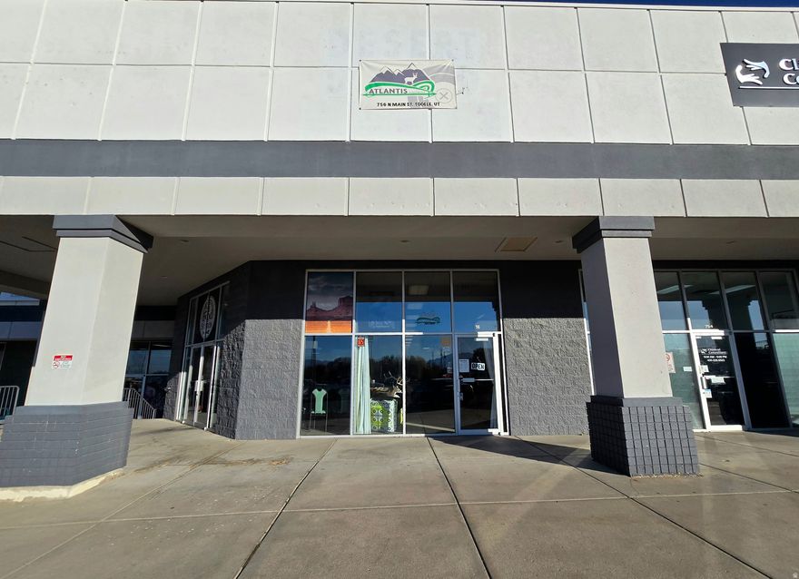 Versatile commercial property on Main Street in Tooele with prime visibility. Great retail flex space suitable for office, salon, or retail. Features include a 14 ft garage door and a finished, soundproof room ideal for podcasting or quiet work. Conveniently located near Cal Ranch and Lucky's Market.