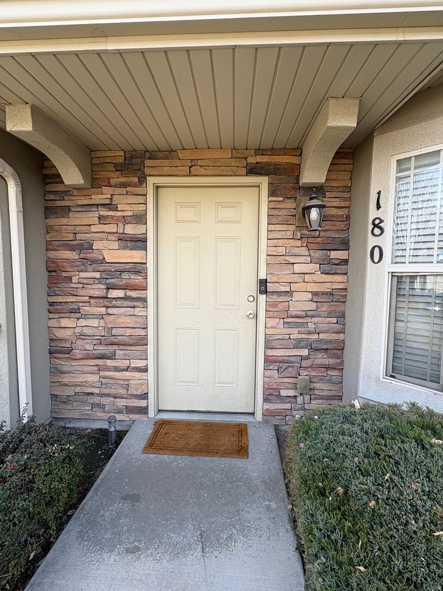 Come take a look at this beautiful design town home, Layout is open with spacious living areas, Master suite has vaulted ceilings and a master bathroom with walk-in closet, 1 car garage plus 1 parking space, close to schools, fwy and stores. Make your appt today