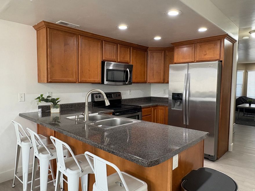 Come take a look at this beautiful design town home, Open lay out with spacious living areas, Master suite has vaulted ceilings and a master bathroom with walk-in closet, 1 car garage plus 1 parking space, close to schools, fwy and stores. Make your appt today