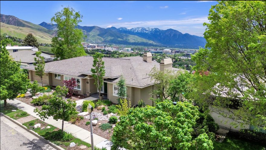 Perched high above the Salt Lake valley in the quiet, highly sought-after Arlington Hills neighborhood this exceptional 5-bedroom, 4.5-bath residence offers luxury, comfort, and convenience in one remarkable package. Enjoy extraordinary, unobstructed south facing valley and mountain views from the spacious chefs kitchen, dining room and living room. Gaze as far as the eye can see across the valley from all 5 bedrooms or any of the three covered balconies. Relax in the sparkling saltwater pool after a day of exploring the endless hiking and biking trails right outside your door. Designed for both beauty and function, this home features main level primary and guest suites with private balconies. Dedicated, private main level home office. An ideal family home perfect for indoor/outdoor entertaining with plenty of room to grow. Lower level walkout featuring 3 large bedrooms, 2 full bathrooms, wet bar, expansive family room and great recreation/play room. Enjoy watching weather move across the valley.Spectacular sunrises and sunsets. Gorgeous xeriscaped front yard. Manicured garden and lawn in back. Intricate stone walls around pool. Putting green. 18 fully owned solar panels significantly off set yearly utilities, energy efficient upgrades throughout ensuring year-round comfort and sustainability. Interior completely remodeled in 2001. This home blends modern elegance with effortless accessibility-perfect for anyone seeking a peaceful retreat. Minutes from downtown Salt Lake City, the University of Utah, 7 + world class ski resorts, U Health hospitals and clinics and Salt Lake International Airport. This lovely home is truly one of a kind with the most remarkable views in the city! Information provided as a courtesy. Buyer to verify all information herein.
