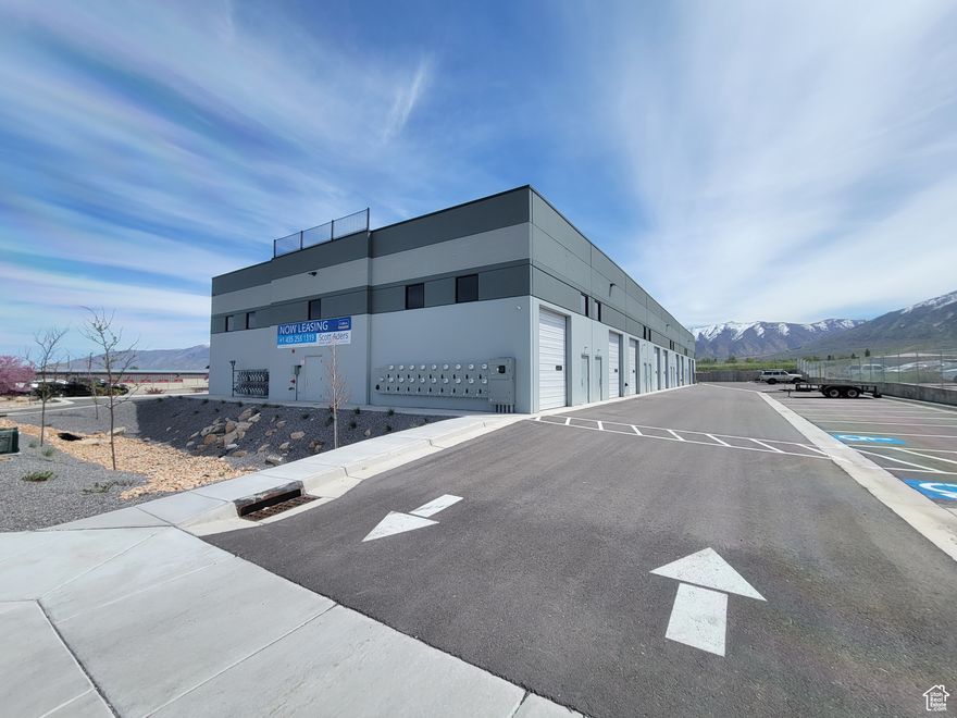 837 SF industrial space with mezzanine, featuring 20' clear height, single-phase power, and a ground-level door. Available now for $1,600/month (*Automotive uses $2,000/month).