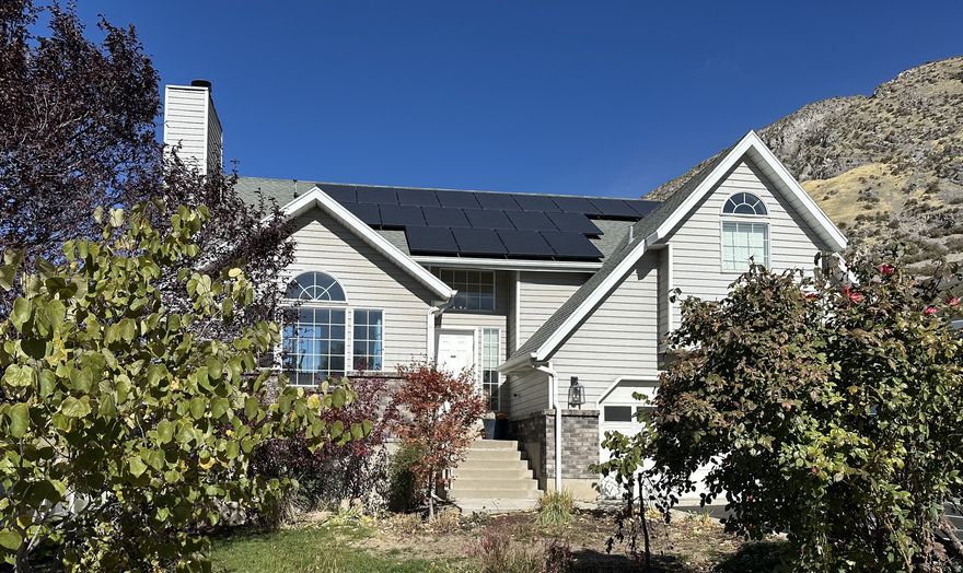 One-of-a-kind Provo Bench home with panoramic mountain, lake, and city views. Features hardwood floors, open kitchen, soaking tub, expansive redwood deck, paid 7.2 kW solar, EV charger, large fenced yard, and sport court pad. Custom upgrades throughout.