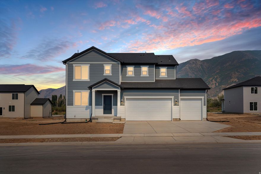 The beautiful home's living room and kitchen island are great for entertaining. Create the perfect media room you've always wanted in the upstairs loft. Unfinished basement included. Move in ready with a washer, dryer, fridge and blinds throughout! Total home approx. sq. ft. 3,065.