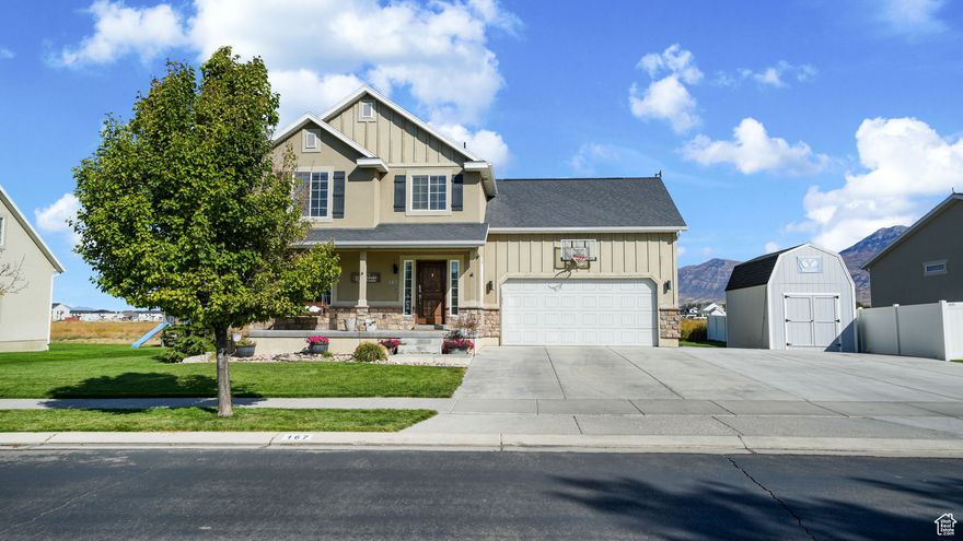 Amazing home near Sleepy Ridge Golf Course in Vineyard. Why wait on a build when you can move in immediately! With a smart layout, this 5 (potentially 6) bedroom home is South facing and includes several features such as granite counter tops, walk in master closet, walk in closet in basement guest room, classy color scheme, 100 % finished basement with exercise room, playroom or Office/Den and a garage with a loft and extra space for a workbench or storage. From your front porch or back patio, enjoy the captivating mountain or water views in this amazing neighborhood. Entertain inside your spacious impeccable kitchen that leads out to your fully landscaped backyard with raised garden beds. Conveniently located near shopping, dining, schools and splash-pad park, this home is a must see.