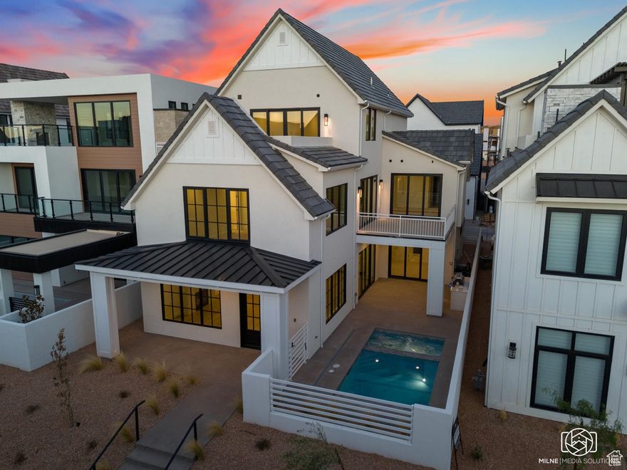 Seller incentive! $50,000 credit at closing! This home offers an unparalleled luxurious vacation rental experience in Desert Color Resort. Spanning 3 levels, this beautiful residence has 7 bedrooms, 7 full baths, and 3 half baths, with the ability to sleep 20+. Each floor features a spacious gathering room, complemented by expansive patios on the main and third levels. This home has a private pool & spa as well as access to Desert Color's incredible amenities. Resort amenities include a 2.5-acre lagoon, heated pool, pickleball courts, snack shack, and BigShots Golf, and more, all located just a short walk from this home. Owners can use the home personally as much as they'd like and rent out any unused dates to earn additional income!