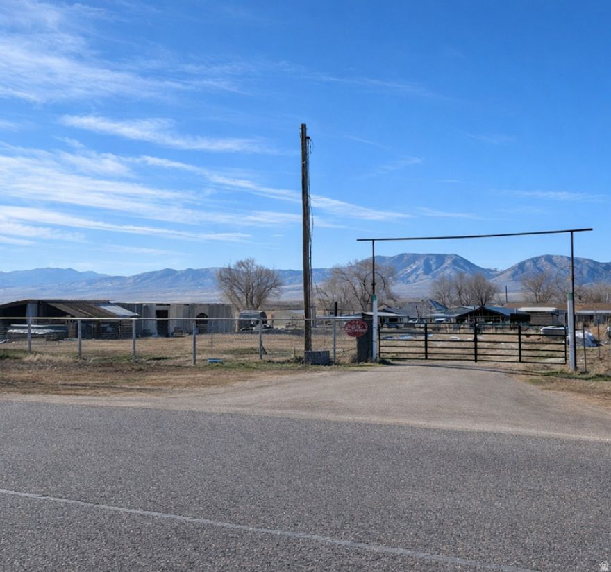 Completed Features  0.50 Acres in Fayette  Fully fenced -acre parcel in a quiet, close-knit community  City water already connected  Power available 30 ish- feet from property  Natural gas available for connection  Gravel driveway installed  Crawl-space already dug and poured  major head start on building.   Horse corrals in place  Multiple outbuildings including sheds and animal structures  Existing chicken coops and small livestock enclosures (bunnies, poultry, etc.)  No irrigation shares required  sprinklers can be run from city water  Included With Purchase:  Approved building permits  House plans and site plan  Construction materials already on site, including:  Attached Inventory List  -Additional Potential: Zoning may allow more than one home on the lot (buyer to verify with city and/or county) -Additional parcel available for purchase 00004506X4 approximate address: 400 S 100 E, Fayette UT