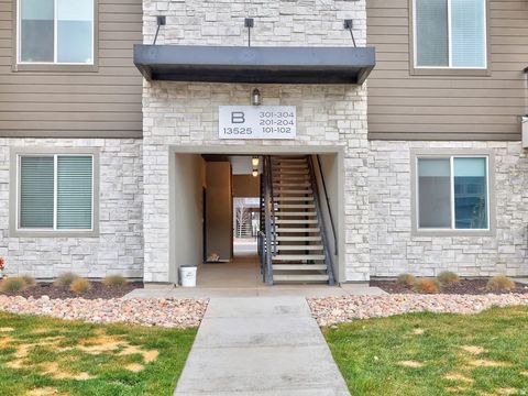 Photo of 13525 S POOLE DR #B202, Riverton, UT 84065 (MLS # 2128040)
