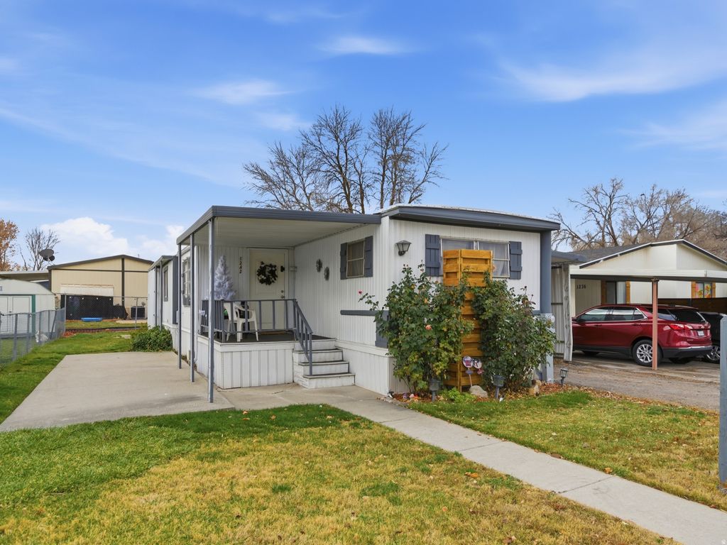 Photo of 1242 E EL SENDERO CIR, Salt Lake City, UT 84117 (MLS # 2126252)