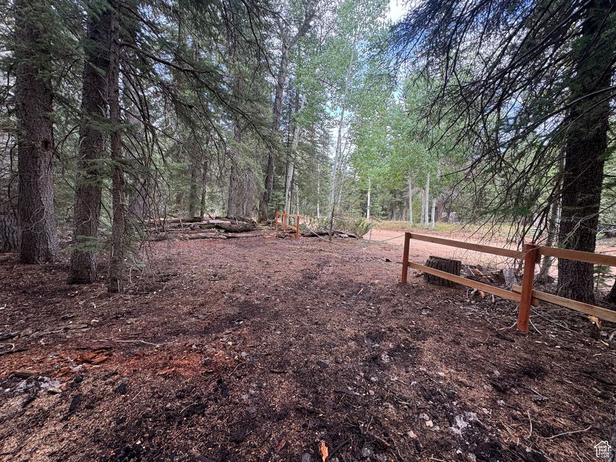 Beautiful 0.71-acre Lot in Bryce Woodlands, perfect for your next adventure or investment. This lot offer plenty of space with 35%  flat land ideal for RVs, camping, or building a cabin. The properties is surrounded by tall, majestic pines, creating a magical and peaceful atmosphere. Lot next door is also for sale MLS: 2119192. Features Two entrances: One for regular vehicles, one for RVs Power & Internet Available Fire pit, picnic Table, eco-bathroom, built with cedar wood You can build a private trail in the back as there are some natural mini caves with panoramic views. Zip Line The Lands are fenced with cedar wood Location highlights:  6.8 miles from Highway 89  30 miles from Bryce Canyon National Park  45 miles from Zion National Park (East Entrance)  50 miles from Kanab  3 hours from Las Vegas Gravel roads make it accessible for any vehicle No HOA or annual fees The elevation is 8,400 feet. In the winter months (mid-November through March), homeowners leave their cars in a parking lot in the subdivision and arrive at their properties in snowmobiles. Building, camping and RV parking are permitted. Power is available but not water. However, just 0.3 miles away, there's a place the subdivision built where you can refill water in containers. The most common thing here is for homeowners to install water tanks on their properties, and a local company supplies them with water when they need it. Septic is allowed They are located in Kanab County. Easy to find Input these coordinates on Google maps. 37.5284895, -112.4027622.