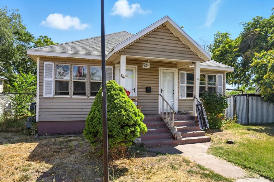 Short Sale! House hack with ease - live in one side, rent the other, or enjoy the whole home yourself while building equity and offsetting your mortgage. This updated and versatile home has two connected living spaces! The updated kitchen brings a fresh feel, while central A/C keeps the home comfortable year-round. Set on a .24-acre lot, there's potential to create your own garden or add chickens. The backyard includes two sheds for storage and is fenced for added privacy. Located just minutes from I-15 for an easy commute and a short distance to downtown Ogden for dining, shopping, and entertainment. This property offers flexibility, convenience, and income potential. Schedule your showing today! Square footage figures are provided as a courtesy estimate only. Buyer is advised to obtain an independent measurement.