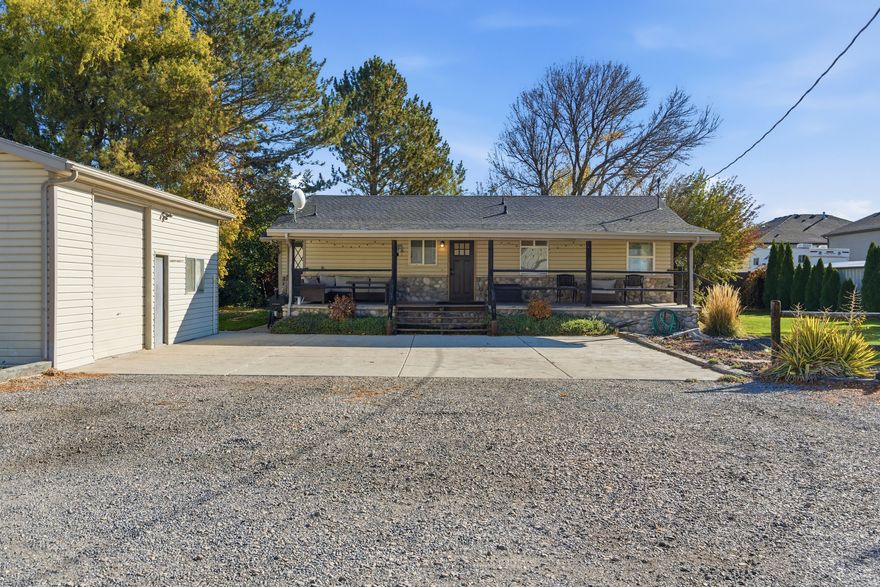 If you're looking to be in the heart of Lehi but need a little elbow room, look no further! Come and see this charming ranch style home located on nearly 2 acres of agricultural property! The property includes beautiful mature trees that add privacy, irrigated alfalfa field, well/well rights, animal rights, and multiple out buildings and facilities to house livestock or store equipment, ATV's, and RV's. There are FUTURE DEVELOPMENT POSSIBILITIES as well! Square footage figures are provided as a courtesy estimate only and were obtained from County records. Buyer is advised to obtain an independent measurement.