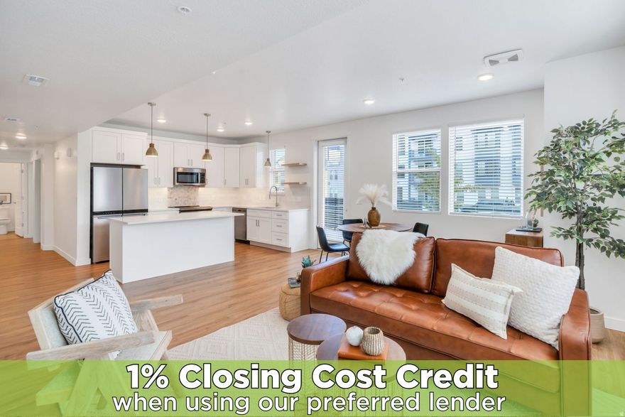 Experience this homes impeccable location in Daybreak's vibrant community! It's a short walk to TRAX, Oquirrh Lake, the new Bees Stadium, Daybreak Library, and U of U Health Care Center! Luxury vinyl plank flooring and abundant natural light greet you, the open-concept Great Room offers a perfect space for unwinding and entertaining. The pristine Kitchen is bright and clean featuring crisp quartz counters, an induction range and convection oven, floating shelving, ambient lighting, and chic pendant light accents! The Primary Suite is spacious and includes a Euro shower, double vanity sinks, crisp cabinetry and a generous walk-in closet! There are two Additional additional Bedrooms and a Full Bathroom, offering space for a home-office, exercise room, study space, library and more! The stackable washer/dryer are included and recent improvements include an Eco Bee thermostat, 2 Ring cameras, room darkening shades and drapes, and a keypad front lock for convenience! Come tour this beautiful home today