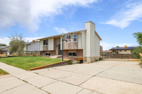 Photo of 5906 W PLUMBAGO AVE S, Kearns, UT 84118 (MLS # 2183042)