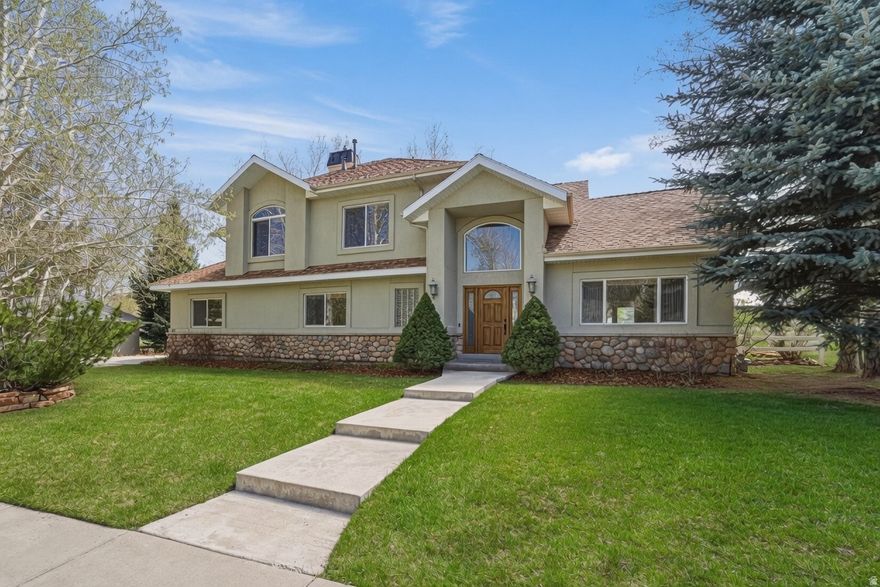 This thoughtfully designed home within the highly sought-after Snyder's Mill neighborhood is 2,648 square feet.  Set on a level homesite in the Silver Springs area, the home captures views of Deer Valley Resort and Park City Mountain Resort, creating a daily backdrop that defines the Park City lifestyle.The home offers four bedrooms and three bathrooms with an open and intentional layout. The main level welcomes you with vaulted ceilings, abundant natural light, and rich hickory wood floors that add warmth and texture throughout. The kitchen is equally suited for quiet mornings and lively gatherings, offering a gas cooktop, wall oven, generous prep space, and a spacious walk in pantry. The adjoining dining and living areas flow seamlessly together, while the gas fireplace invites relaxed evenings and effortless entertaining.  A dedicated office on the main level provides a quiet space for work or creativity.  A dedicated laundry, powder room and attached 2-car garage round out the level.   Upstairs, the primary suite serves as a private retreat, including an ensuite with dual vanities, a soaking tub, shower and a custom walk in closet. The additional bedrooms are thoughtfully finished with custom closets, and the secondary bathroom includes double vanities and linen cabinets.  Outdoor living is equally compelling, with a back patio that opens to expansive mountain views and offers a front row seat to the seasonal fireworks at Canyons Village. The landscaped yard provides a peaceful setting for outdoor dining, relaxation, and year round enjoyment.  Ideally located within the Park City School District and just minutes from world class skiing, trail systems, dining, and daily conveniences, this home delivers a rare opportunity to experience mountain living with ease, access, and enduring appeal.