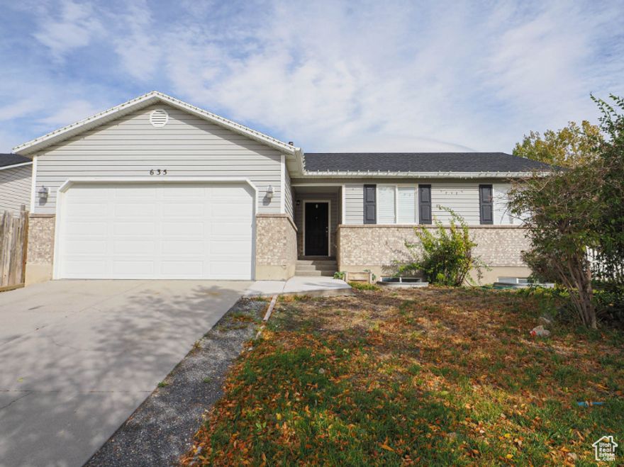 Updated Rambler in great Grantsville location.  Home is at the end of a quiet street with farmland behind.  Home has 3 bedrooms and 2 baths.  Updated kitchen with stainless steel appliances and new flooring on the main 2023. 2 car garage and fully fenced yard.  New Water Heater, Garage door, paint,  and Faucets in 2023. The basement is unfinished with room to grow and has a basement entrance.   Call Agent for details.