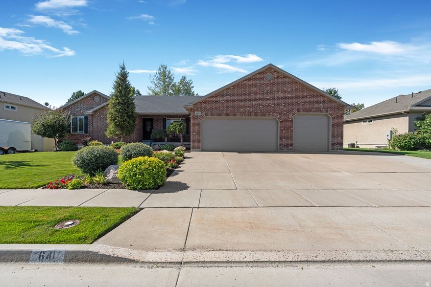 This lovely, spacious home, nestled inside a peaceful setting, boasts a formal Living Room & an open-concept Great Room for life's special moments, a massive 4 car garage, emergency transfer switch, finished Walkout Basement w/ fireplace, huge Family Room, & 3 more large Bedrooms, plus a location which is a convenient, hidden treasure!