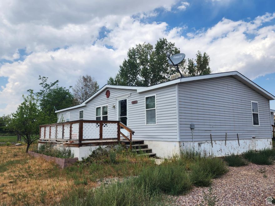 Huge price improvement! Home needs lots of love, but the potential is there. Home has 4 bedrooms, 3 bathrooms and is nestled on  an acre with a huge garage shop. This home could be perfect for a primary home or vacation home. Agent related to Sellers.   Square footage figures are provided as a courtesy estimate only and were obtained from an appraisal.  Buyer is advised to obtain an independent measurement.