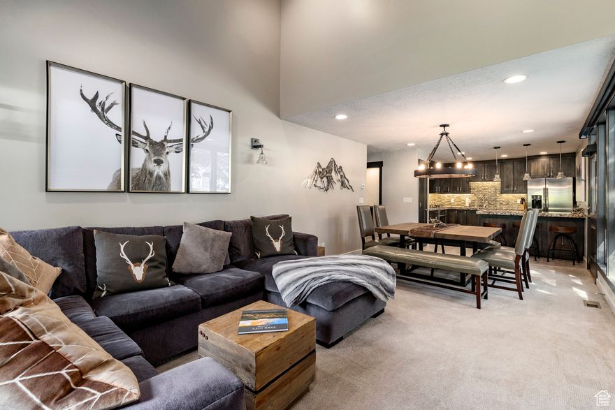 Beautifully renovated from top to bottom, this 4 bedroom, 4 bath condo is perfectly situated right in the heartbeat of Park City, putting it all right at your doorstep. A perfect blend of year-round enjoyment, imagine waking up steps from the golf course during the warmer months, and simply crossing the street to catch a discreet elevator whisking you right up to the base of the ski lift while the snow is falling. Inside, a bright, open living area, a whopping 4 separate deck spaces throughout, one complete with jacuzzi, cozy bedroom areas and thoughtful finishes instantly blends mountain charm with modern day ease. Whether you're hosting friends after a powder day, strolling to the nearby Historic Old Town, or soaking in the mountain air from one of your patios, this perfectly positioned gem is made for easy, effortless Park City living or investment opportunities.