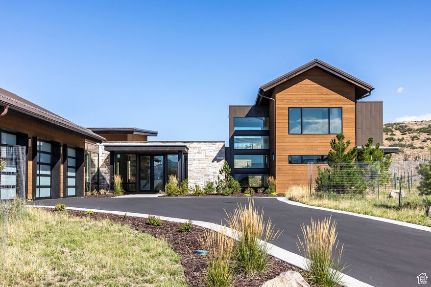 This immaculate custom home is 7,367 sq. ft. with 5 bedrooms and 7 bathrooms. 2005 N. Lookout Peak Circle is situated at the very top of the Red Ledges Community offering total privacy and breathtaking views of the entire Heber Valley, Mt. Timpanogos, and Deer Valley. This property has a Red Ledges Golf Membership available to purchase.