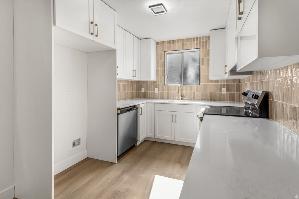 Photo of 5504 W TICKLEGRASS RD S, West Jordan, UT 84081 (MLS # 2176552)
