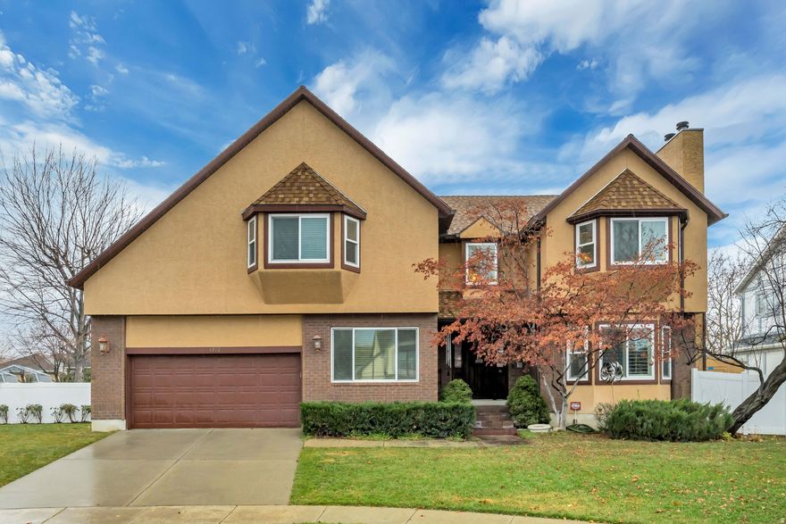 Welcome to 1972 E Everleigh Circle in a quiet and desirable Sandy neighborhood. This spacious 4-bedroom, 2.5-bath home offers a well-designed floor plan with a formal front room, main-level office, and a comfortable family room, each featuring a fireplace. The large kitchen has been beautifully remodeled with granite countertops, stainless steel appliances, and new wood flooring that extends through the kitchen, music/dining room, main-level office, and primary bathroom. The primary suite is oversized and includes its own fireplace, a dual-sink vanity, a separate tub and shower, and a jetted soaking tub. Bedrooms are generously sized and offer excellent flexibility. Recent updates include a replaced water heater, updated staircase with newels and railing, new interior doors throughout, updated bathroom countertops and fixtures, reverse osmosis system, upgraded gutters, and a new garage door opener. Outdoor improvements include a Trex deck with updated railing, white fencing, and a new storage shed.  Contact the listing agent for additional details or to arrange a private showing.