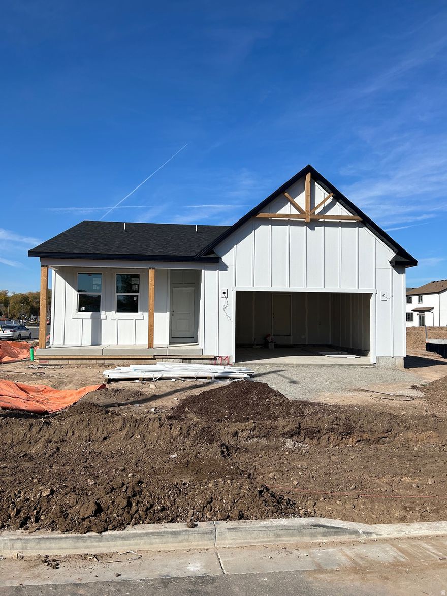 This fully finished comfort designed rambler featuring a covered patio, fireplace, quartz countertops, and full main floor living is facing the golf course and has full, high end hardie exterior. Lots of interior upgrades!  On track to be completed before the end of the year.