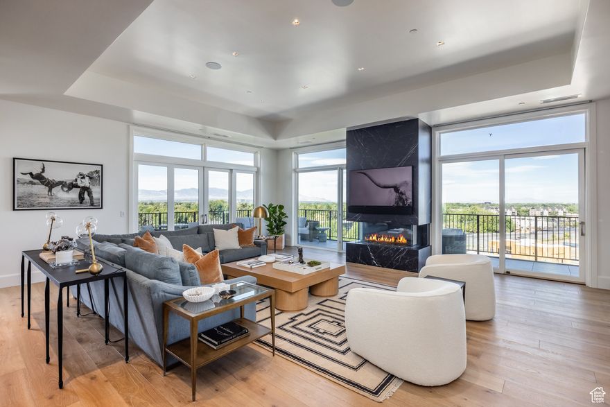 Penthouse #508 is located in The Grandeur - a highly secure building with unmatched amenities - this home is ideal for those seeking a simplified lifestyle or looking to downsize without sacrificing quality, comfort, or location. Masterfully designed by Carrie Oliver in collaboration with Co & CoCurated, where every element reflects a perfect harmony of luxury and livability. Thoughtfully crafted with an eye for detail, this penthouse offers an elevated lifestyle experience that seamlessly blends comfort with sophistication.  Key Features:  Expansive great room designed for connection, celebration, and effortless entertaining  Gourmet chef's kitchen featuring elegant Neolith porcelain countertops  Heated floors in the spa-inspired primary bathroom  Large Private patios showcasing breathtaking mountain views and the serene Big Cottonwood Creek  Private 2-car garage with additional storage  ensuring convenience, security, and exclusivity  Nestled within Holladay Hills, a 58-acre, vibrant NEW community offering 750,000 square feet of office, dining, shopping, and entertainment spaces. With scenic walking trails boarding Big Cottonwood Creek, central plazas, and a spacious park perfect for gatherings, this dynamic development brings together everything you need for modern living. Unbeatable panoramic mountain views, 16 miles to Alta / Snowbird resort, convenient proximity to all other Ski resorts, Downtown Salt Lake City, Silicon Slopes, and Salt Lake City International Airport. Come for the luxury. Stay for the lifestyle.