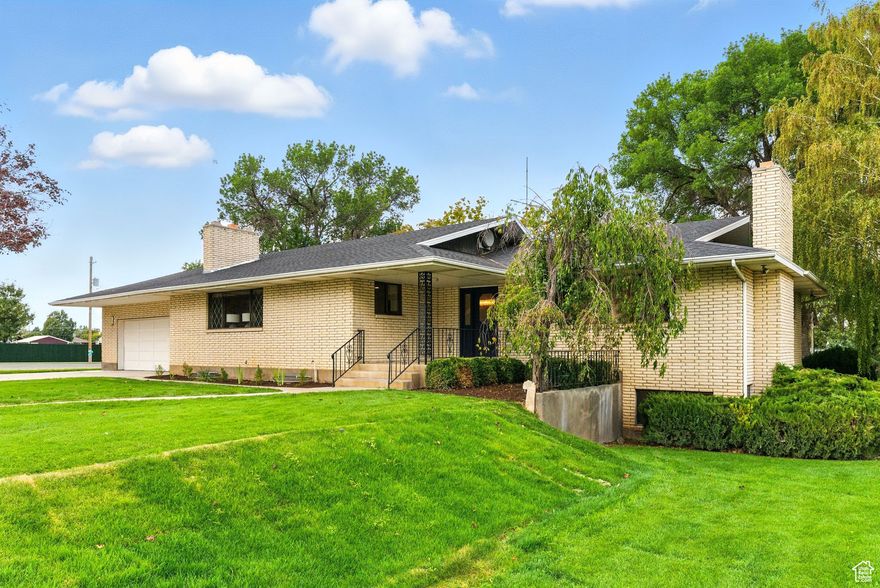 BEST VALUE IN JUAB COUNTY! Professionally designed and completely remodeled home in the heart of Nephi!  INCLUDES 1 IRRIGATION WATER SHARE. Featuring single-level living with an open floor plan that is inviting and welcoming to everyone who enters, as well as a MOTHER-IN-LAW apartment with a separate entrance. Enjoy the Large kitchen with all stainless steel appliances, a built-in microwave, built-in double ovens and an induction cooktop. The home features high-end finishes such as waterproof LVP flooring, Granite, Quartz, and Quartzite countertops. There are two large family rooms on the main floor of which BOTH have a wood-burning fireplace. The primary suite offers a custom built-in wardrobe, a large shower, and double sink vanity that is well-lit for anyone getting ready in the morning. The main floor offers 2 bedrooms, 3 beautiful bathrooms, and laundry. Downstairs you will find 3 more bedrooms and a bathroom that features a huge 9 foot double sink vanity and a five and a half foot deep soaker tub. There is a second full kitchen with stainless steel appliances, family room, laundry, wood burning fireplace, and SEPARATE ENTRANCE. The home also features central heating and air throughout. This home sits on a beautiful .35 acre corner lot in the most desirable area of Nephi. With mature trees, a beautiful landscaped yard, a new sprinkler system, and a large covered patio, you'll find yourself enjoying the outside of the home almost as much as the inside. With spectacular views of Mt. Nebo and the ability to hop on your ATV and ride off the driveway straight to the mountains, this home really has it ALL!