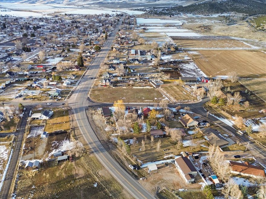 Beautiful Rural Community with Loyal Customers! Great Location, high traffic and room for expansion.  Next closest station 8 miles. 90 years family owned business, 35 years with current owner.  Property Includes: 3 bays, 1 office, and 2 restrooms.  Equipment includes metal shelter for snow plows, 1 mobile glass van, 1 mobile calibration equipment van, 1998 flatbed Ford Rollback (wrecking van), 1977 Dodge 250 army-issued snow plow truck, 80 gallon 7-hp air compressor.  POSSIBILITY OF ELECTRIC CHARGING STATION.  Contact Listing Agent.  Do Not Access The Property Without The Listing Agent.  Buyer agent must accompany Buyer.  Buyer must be able to show proof of ability to purchase prior to showings or release of financials. Property must be sold with MLS# 2098449 -- 83 South State Street, Fountain Green.