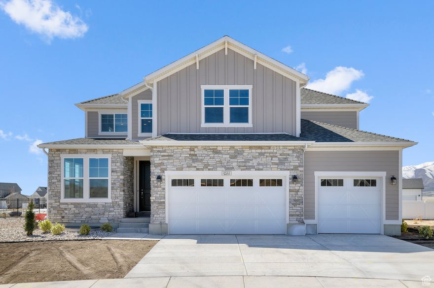 Come see this gorgeous brand new Midas Creek Home that offers a perfect blend of modern comfort and design in a much sought after Eagle Mountain Overland Community! Featuring quartz kitchen countertops, stainless steel gas appliances, and tile backsplash, the kitchen is both stylish and functional. The home's flooring includes laminate hardwood, tile, and carpet, providing a warm and inviting feel throughout. Designed for convenience, this home includes a 3-car garage with keypad, an expanded patio, and energy-efficient options and includes additional features such as can lighting, Christmas light outlets, and a gas log fireplace that provides a cozy ambiance. The owner's bathroom boasts cultured marble shower surrounds, complemented by brushed and satin nickel hardware. The wood railing at the stairway, craftsman base & casing, and 2-tone paint add character and sophistication, among many other features! Comes fully landscaped with water wise elements that is maintained by the HOA for easy care, hassle-free living!