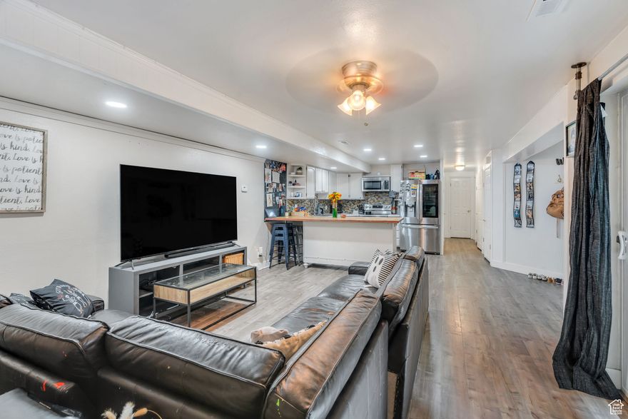 Bldg 12. Major upgrades done. This well-kept 3-BEDROOM, 1.5-BATH CONDO in the desirable WILLOWBROOK COMMUNITY offers peace of mind thanks to a NEWER ROOF with roof ASSESSMENT PAID IN FULL ($7K VALUE), UPDATED DUAL-PANE WINDOWS, UPDATED FURNACE MOTOR, NEWER WATER HEATER, NEW ELECTRICAL SUB-PANEL, and STAINLESS-STEEL APPLIANCES. Inside, you'll find EXPANSIVE LVT FLOORING that flows from the living room through the kitchen and hallway, a bright kitchen with QUARTZ COUNTERTOPS, BUTCHER-BLOCK PENINSULA, PAINTED CABINETS, and STAINLESS-STEEL APPLIANCES. The FULL BATHROOM IS NICELY UPDATED, and an UPDATED SLIDING GLASS DOOR opens to a LARGE PRIVATE PATIO AREA - perfect for relaxing or entertaining.  The PRIMARY BEDROOM features HIS-AND-HERS CLOSETS, and the home offers LOTS OF STORAGE throughout. This unit SHOWS GREAT and includes 1 COVERED PARKING SPACE and a SEPARATE STORAGE AREA.    Community amenities feature a POOL, TENNIS COURT, and a CLUBHOUSE WITH A SMALL GYM. The HOA COVERS WATER, TRASH, AND SEWER.  Located just 2.6 MILES FROM BYU, UNDER 5 MILES FROM UVU, and LESS THAN 10 MINUTES FROM TRADER JOE'S, with nearby EATERIES, SHOPPING, AND ENTERTAINMENT - including WINGERS and PANDA EXPRESS at PROVO TOWNE CENTRE, THE CHEESECAKE FACTORY and P.F. CHANG'S at UNIVERSITY PLACE, and GURU'S CAF and STATION 22 CAF in DOWNTOWN PROVO (3.5 MILES / 10 MINUTES AWAY) - all within easy reach for dining, shopping, and entertainment.    Enjoy quick access to outdoor recreation - just 20 MINUTES TO SUNDANCE RESORT, 25 MINUTES TO DEER CREEK RESERVOIR, and 15 MINUTES TO BRIDAL VEIL FALLS, with countless nearby HIKING AND BIKING TRAILS in the surrounding mountains.  Currently leased at $1,559/MONTH THROUGH APRIL 2026, but the tenant IS WILLING TO VACATE UPON SALE, offering flexibility for both INVESTORS AND OWNER-OCCUPANTS.