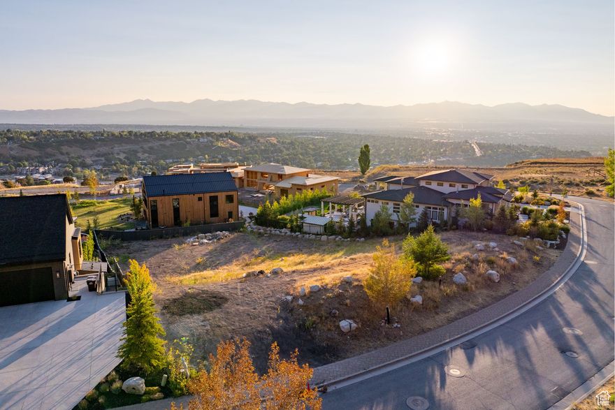 Welcome to Tavaci, where heaven meets earth. This rare .58-acre luxury homesite is nestled in one of Salt Lake City's most exclusive east-side communities at the entrance of Big Cottonwood Canyon. The lot captures breathtaking views of both the valley below and the soaring mountains above, including the dramatic mouth of the canyon itself. Backing Forest Service land, this property offers unparalleled privacy while still being part of a prestigious Parade of Homes subdivision. With direct access to world-class skiing, hiking, and outdoor recreation, Tavaci combines a serene mountain setting with the convenience of being just minutes from the city. This is the ideal place to build a truly custom luxury estate surrounded by natural beauty and unmatched views. Lot size is provided as a courtesy estimate only and was obtained from County Records. Buyer is advised to obtain an independent measurement.