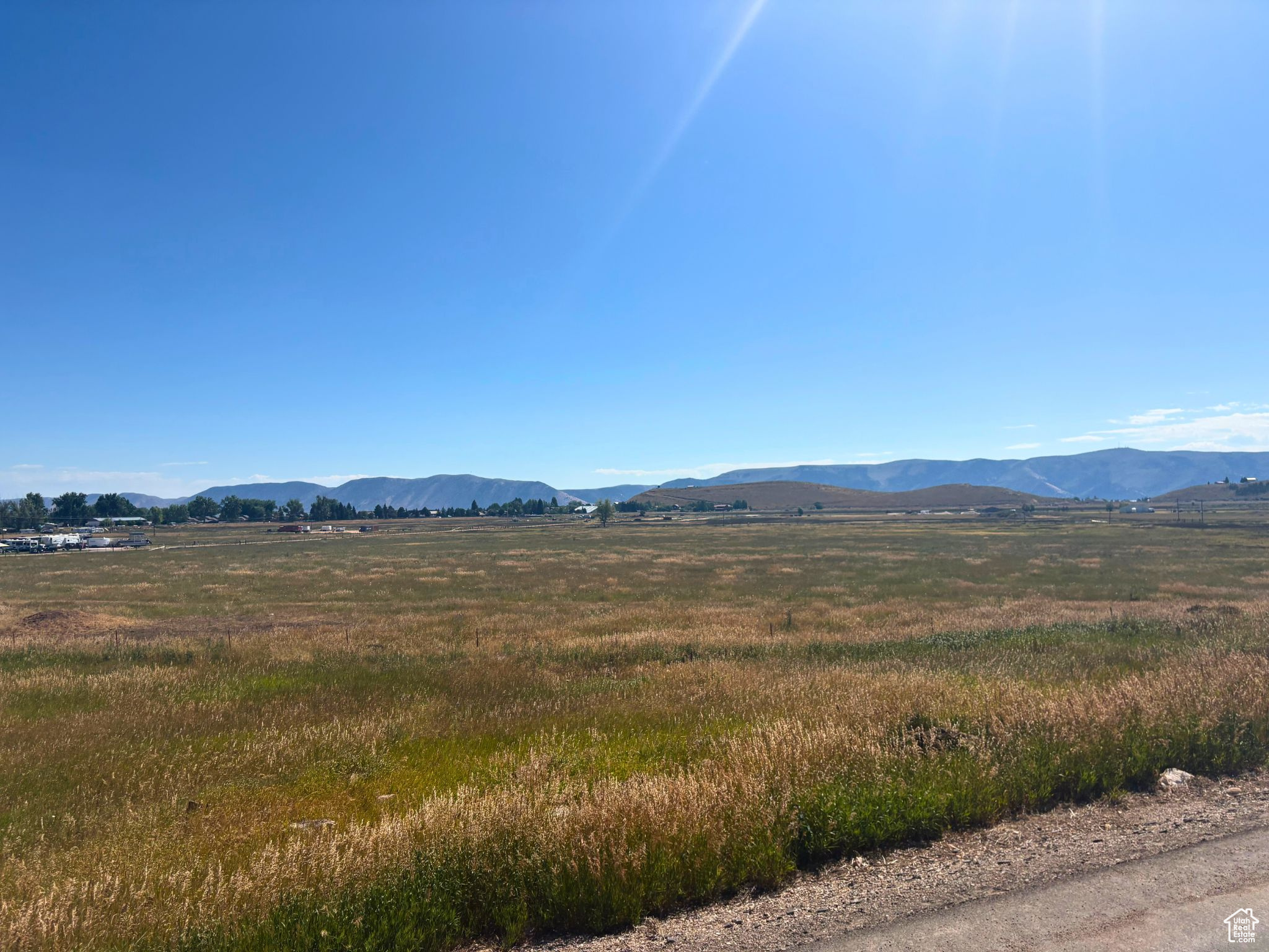 Great buildable lot in the Sweetwater Golf Course Subdivision with easy, paved access via Country Club Drive. Gently sloped topography may allow for a daylight basement. Utilities appear to be nearby-buyer to verify hookup availability and fees. East-facing orientation provides excellent morning sun and all-day natural light. Located close to Bear Lake Golf Course, The Sinks trail access for snowmobiling and ATV/UTV riding, and just minutes from downtown Garden City for shopping and dining. Optional amenities available at Ideal Beach Resort for an additional fee, including pools, hot tubs, beach access, and more. Beaver Mountain Ski Resort is approximately 20 minutes away. Nightly Rentals Allowed