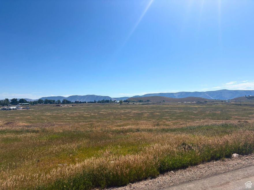 Great buildable lot in the Sweetwater Golf Course Subdivision with easy, paved access via Country Club Drive. Gently sloped topography may allow for a daylight basement. Utilities appear to be nearby-buyer to verify hookup availability and fees. East-facing orientation provides excellent morning sun and all-day natural light. Located close to Bear Lake Golf Course, The Sinks trail access for snowmobiling and ATV/UTV riding, and just minutes from downtown Garden City for shopping and dining. Optional amenities available at Ideal Beach Resort for an additional fee, including pools, hot tubs, beach access, and more. Beaver Mountain Ski Resort is approximately 20 minutes away. Nightly Rentals Allowed